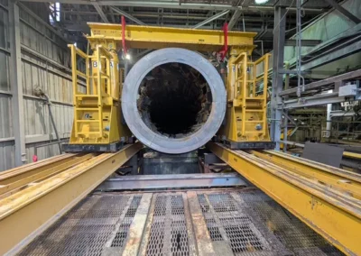 Large cylindrical industrial equipment being inspected during plant maintenance project
