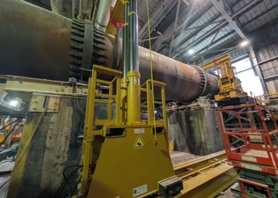 Hydraulic lifting system supporting large industrial equipment during plant maintenance work